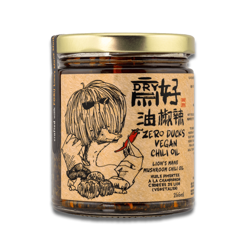 Holy Duck Zero Ducks vegan chili oil jar on grey background — lion's mane mushroom chili oil, no MSG